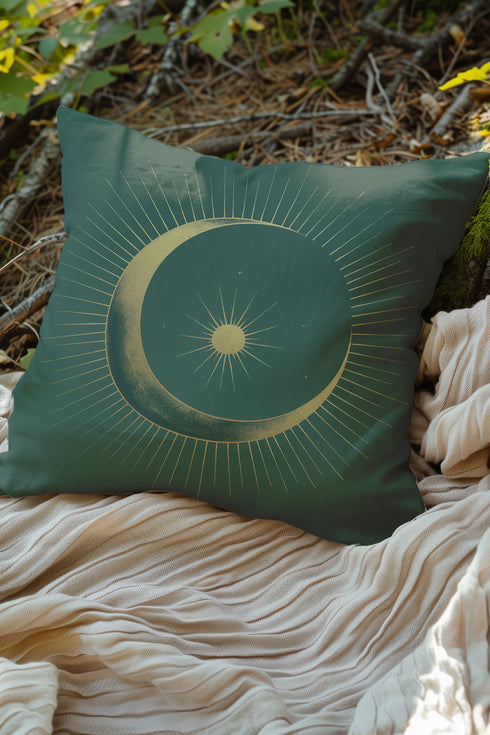 Emerald green throw pillow cover featuring a golden crescent moon and sun design with radiating lines, perfect for celestial or bohemian decor themes.